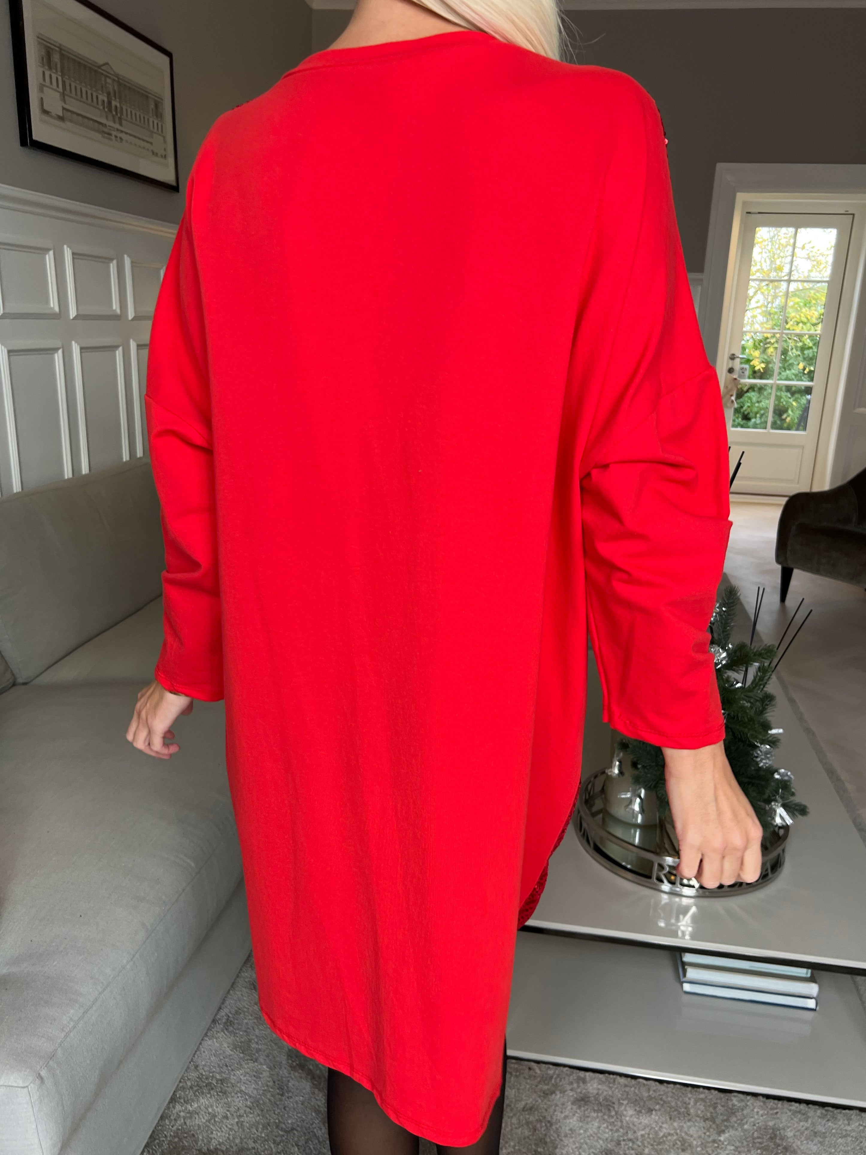 Eria - Klänning med paljetter på framsidan